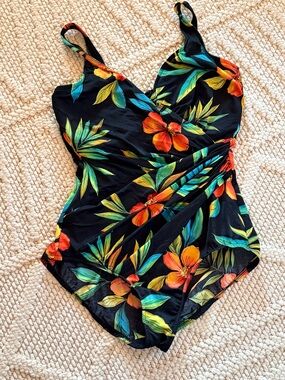 MIRACESUIT Floral One-Piece Swimsuit in Black with Orange & Green Print